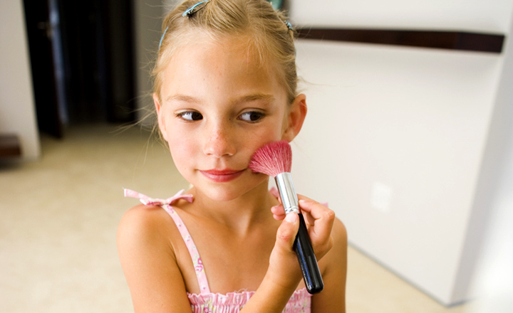Girl playing dress-up