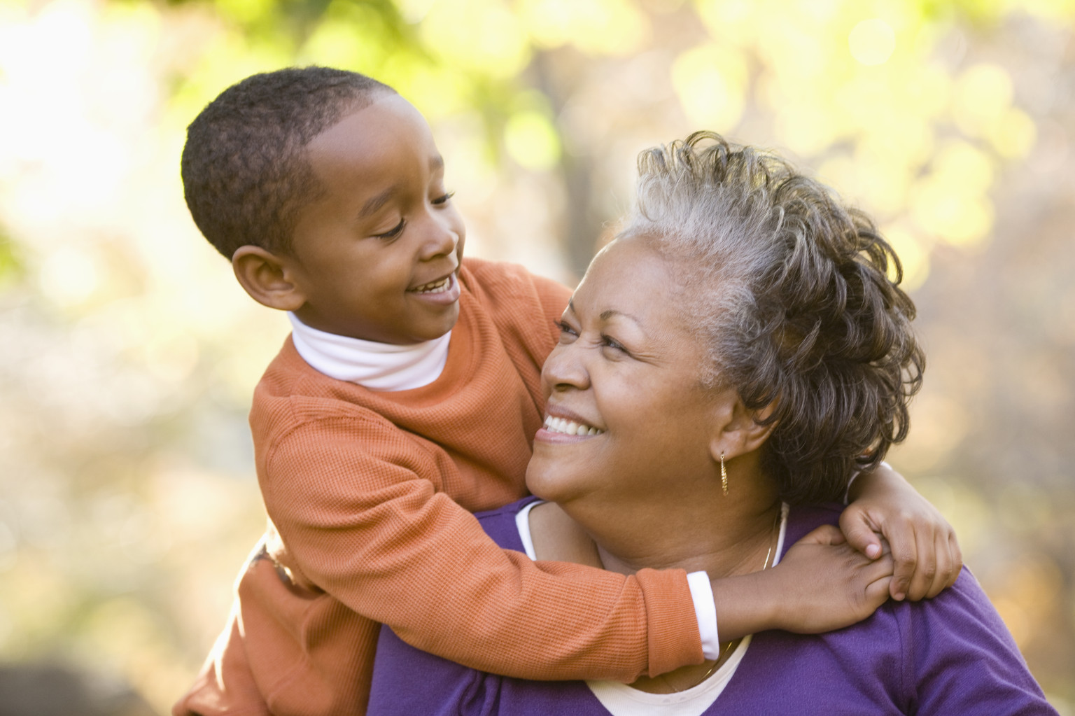 Grandson hugging grandmother