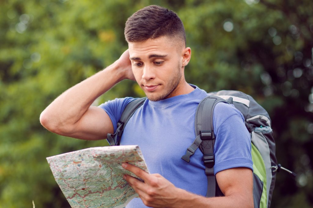 Young tourist hiking alone