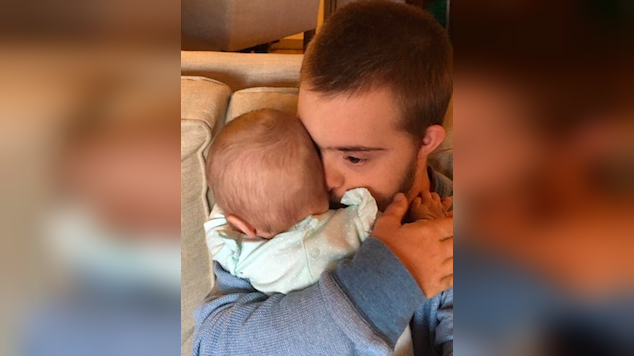 downs-syndrom-brother-hugs-baby-2