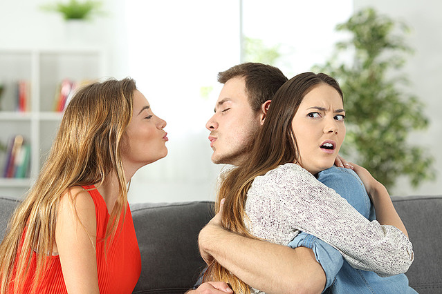 Girlfriend discovering that her boyfriend is cheating with her best friend at home