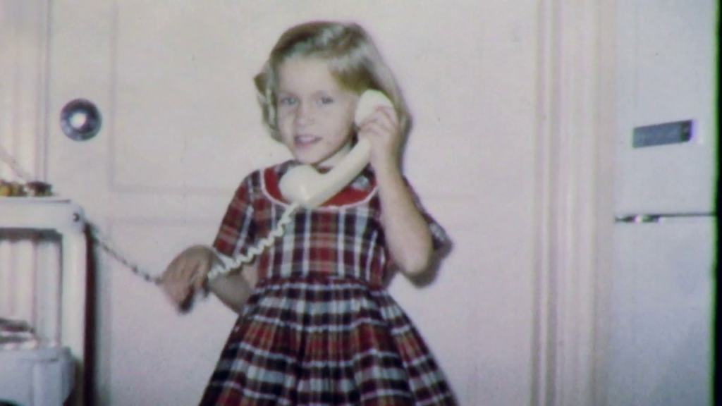little-girl-on-the-phone-to-daddy-1950s-vintage-old-retro-film-home-movie-4873_h_6eabyx__f0004