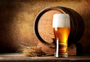 Wooden barrel and beer