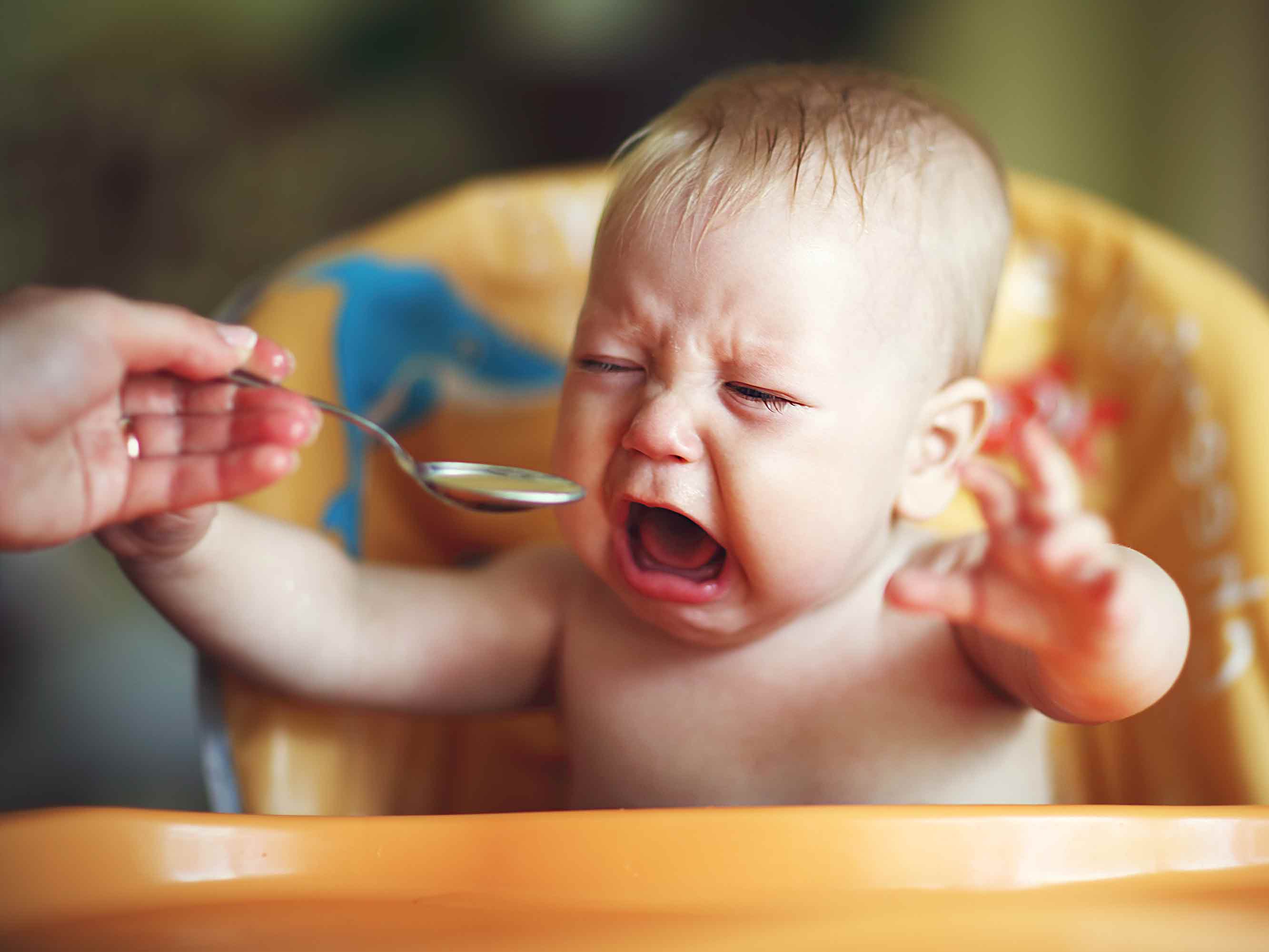 baby-crying-while-eating-cereal-denver-bumgarner