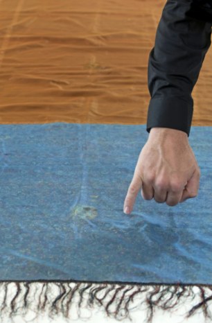 Evidence: Russell points to the part of the shawl where DNA was found