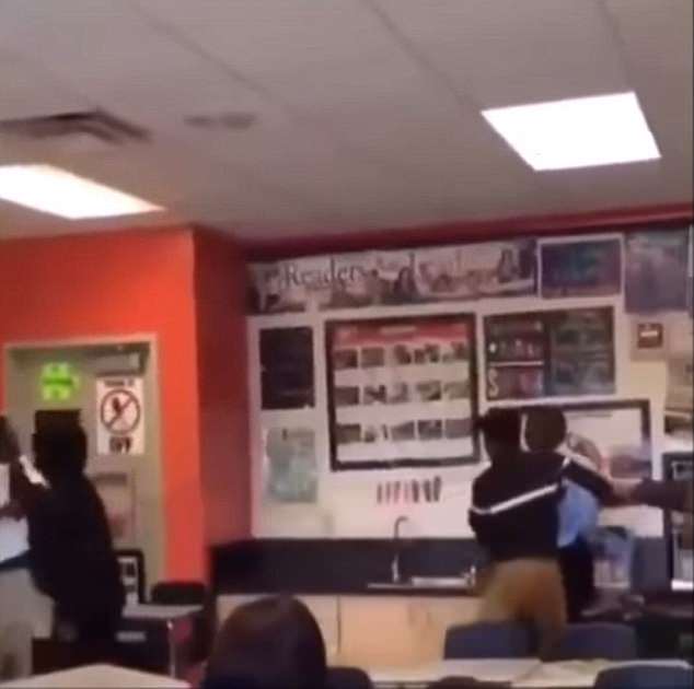 The students then pinned the teacher and pupil to different sides of the classroom