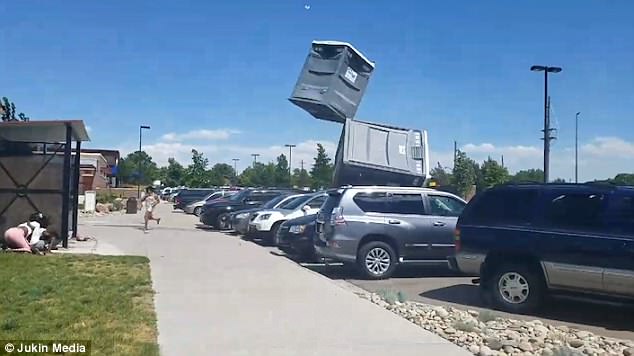 People were forced to dive for cover after a huge blast of wind whipped through a park in Commerce City, Colorado