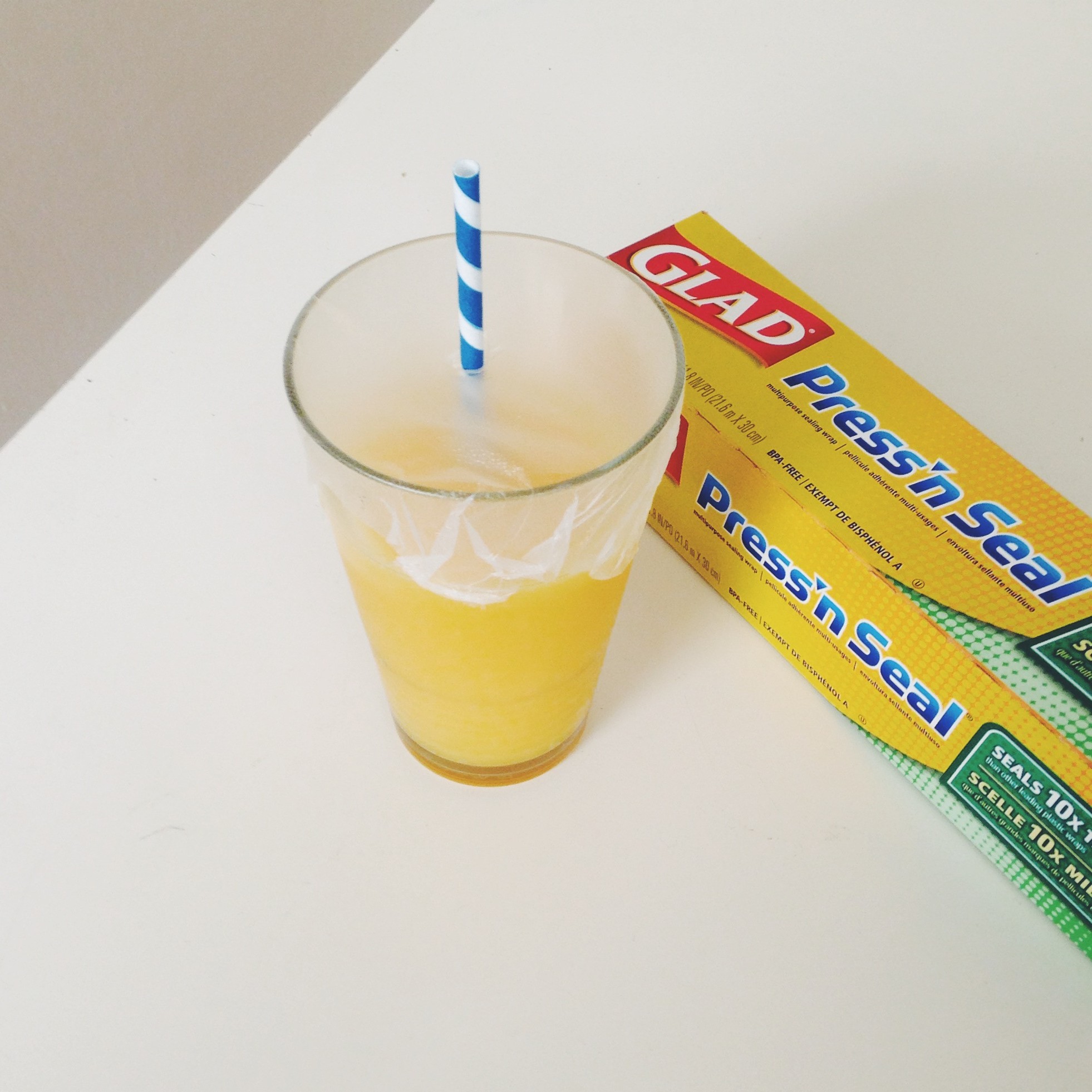 A DIY To-Go Cup for smoothies using Glad Press N Seal Wrap and A Straw