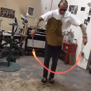 Glassblower Playing Jump Rope With Molten Hot Glass