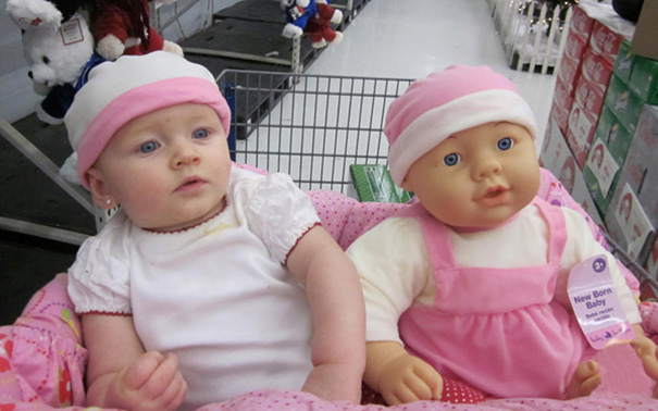 Baby And A Look Alike Doll