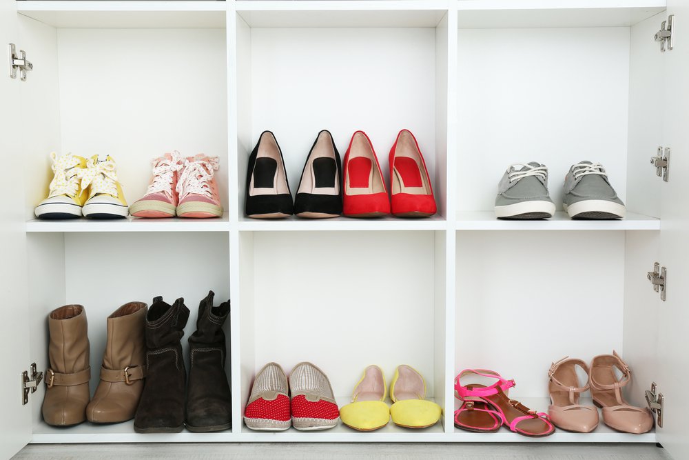 Collection of shoes on shelves