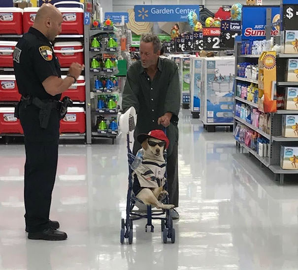 Guy Strolling His Dog At The Store