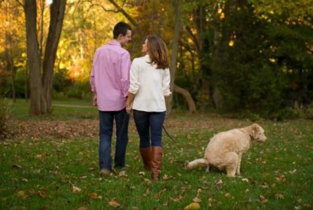 Dog pooping during engagement picture shoot