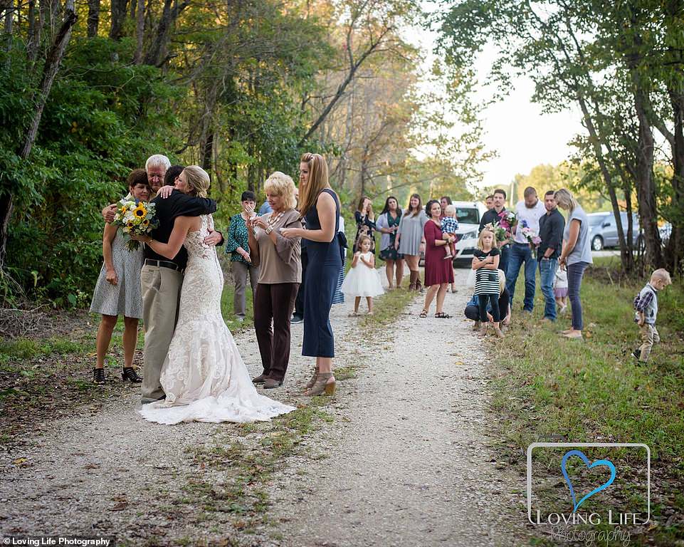 Jessica is seen hugging family members as several of them become emotional during the photoshoot 