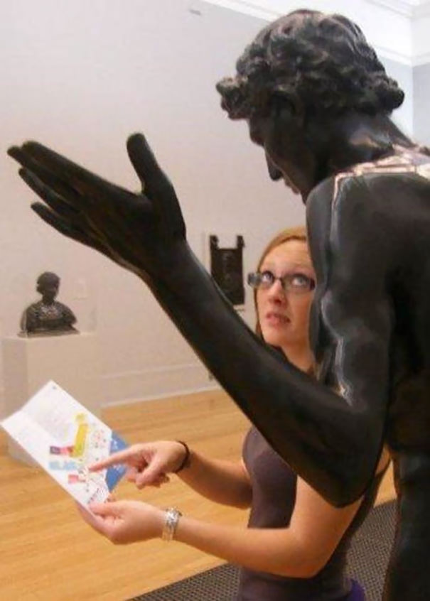  Funny People posing with statues 