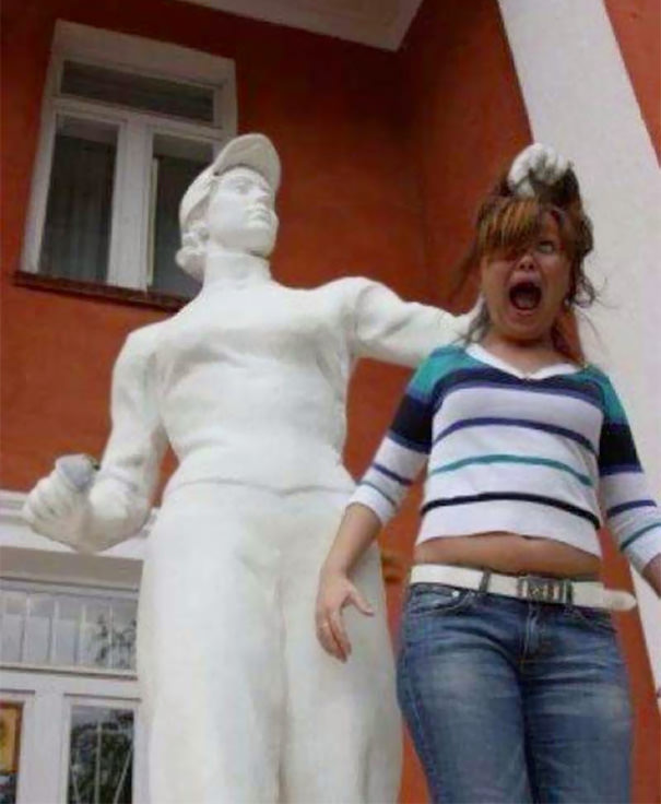  Funny People posing with statues 