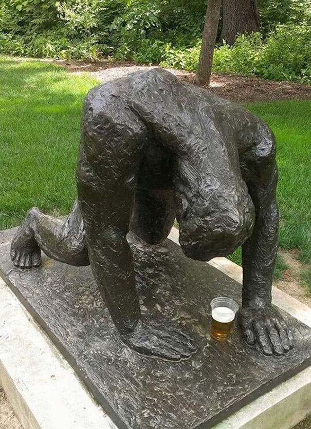  Funny People posing with statues 