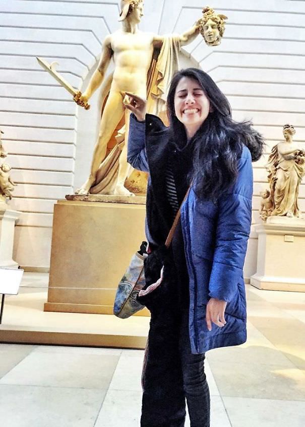  Funny People posing with statues 