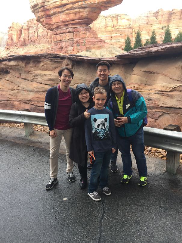  My Son Was Asked To Take A Picture Of A Nice Asian Family At Disneyland. He Did Not Understand