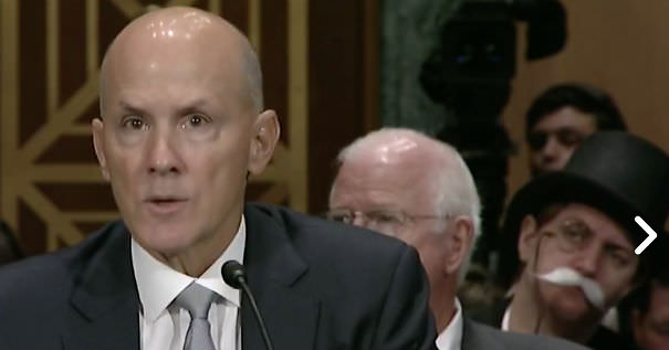 Monopoly Man In Background During Equifax Senate Hearing