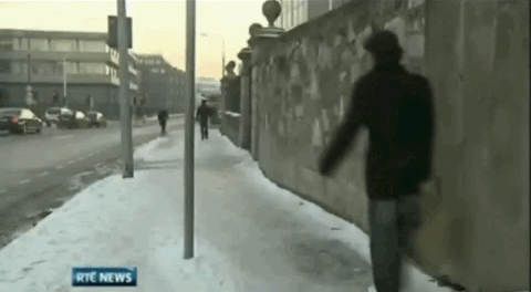 man slips on ice gif