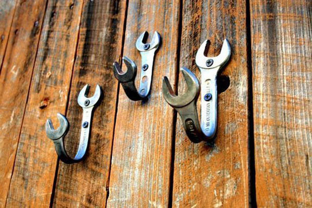 18 Upcycling Ideas - Bend old wrenches into wall hooks.