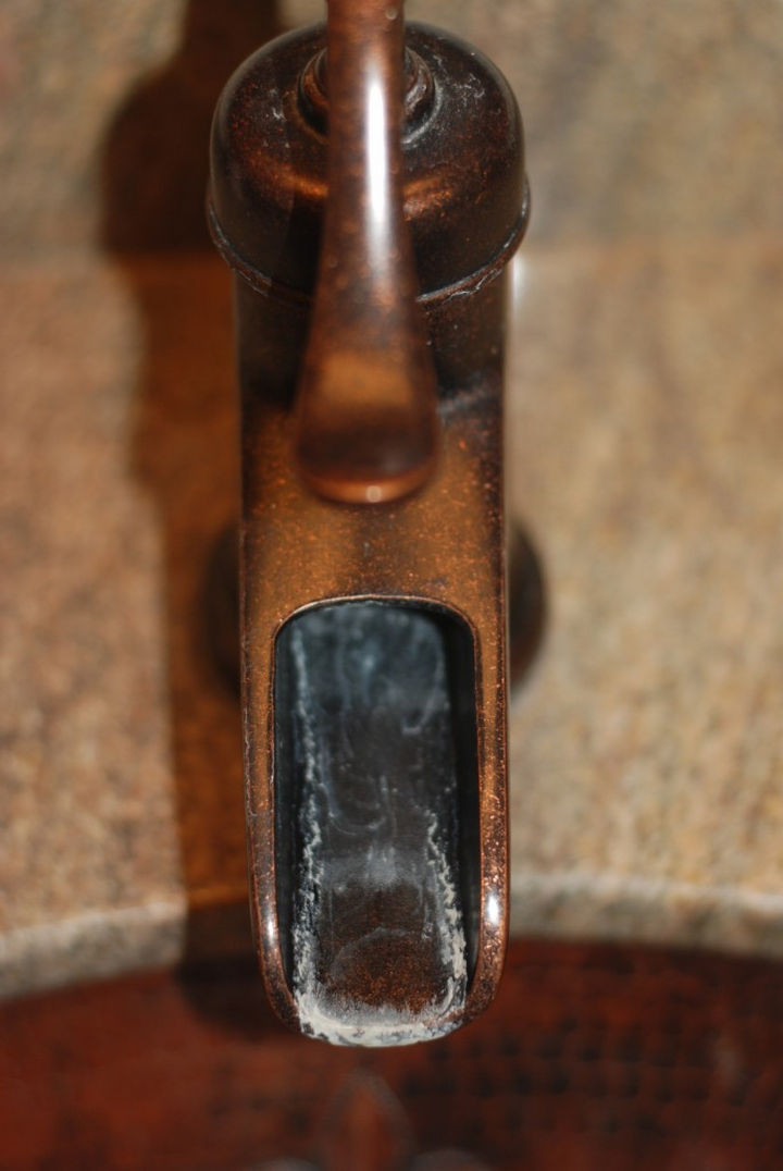 35 House Cleaning Tips - Remove hard water stains from your faucets.