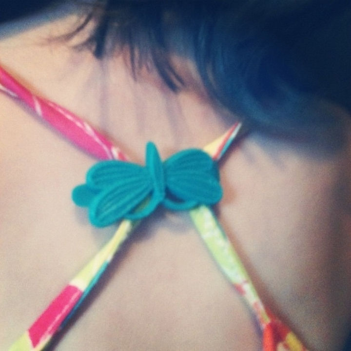 24 Life Hacks for Kids - Secure loose tank top straps with a barrette.