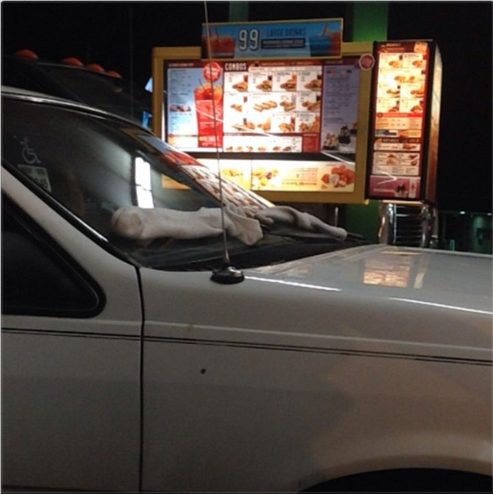 51 Crazy Life Hacks - Socks will keep your windshield spotless and your wipers warm.