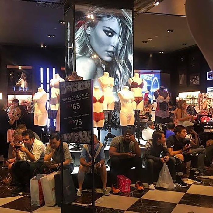 Miserable men shopping 