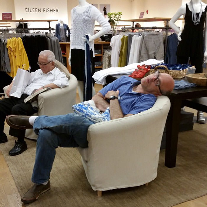 Miserable men shopping 