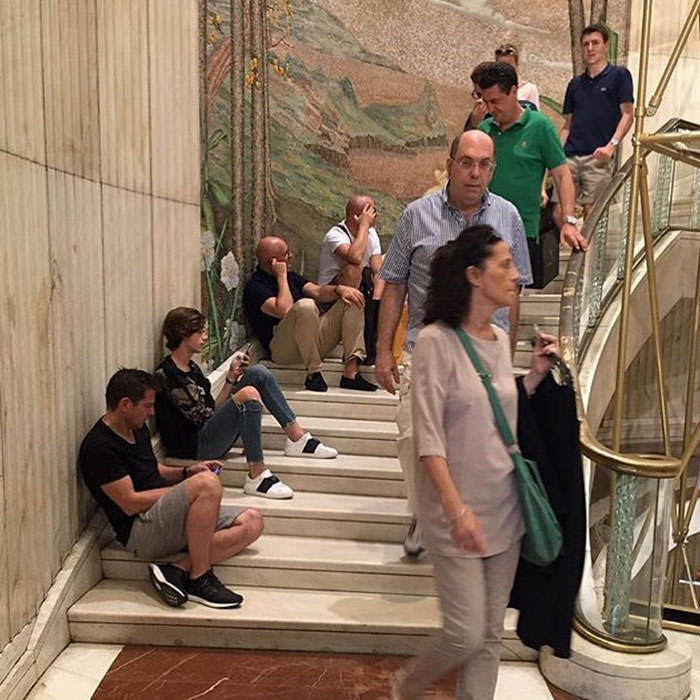 Miserable men shopping 