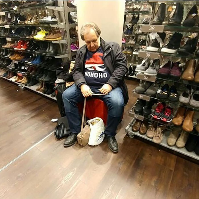 Miserable men shopping 