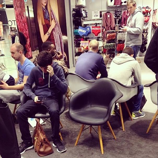 Miserable men shopping 