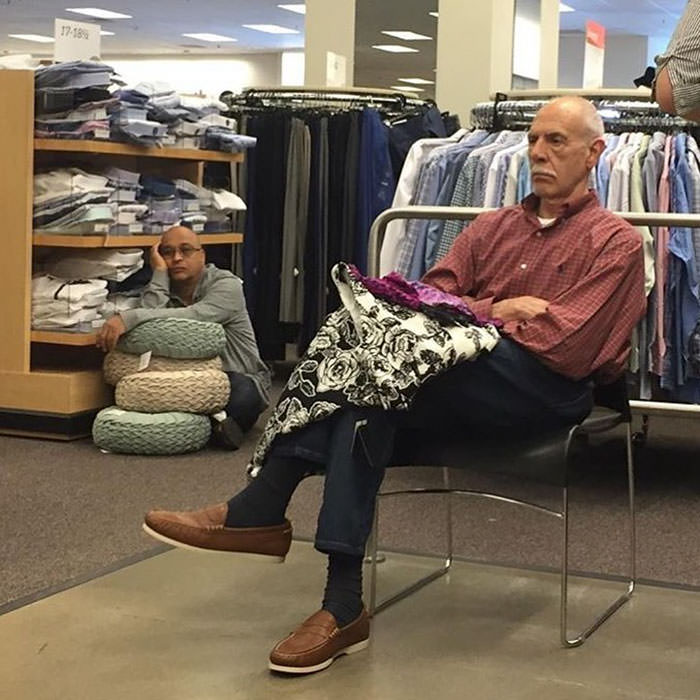 Miserable men shopping 