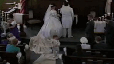 Okay, so here are the bad news: this pissed off little guy threw the ring bearer pillow and ruined the moment.