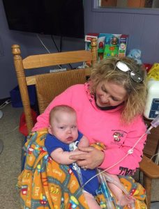 Image may contain: 1 person, baby