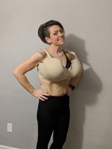 Image may contain: 1 person, smiling, standing