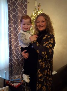 Image may contain: 2 people, people smiling, people standing