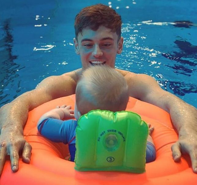 Tom Daley and His Husband Dustin Lance Take Their Son Robbie for ...