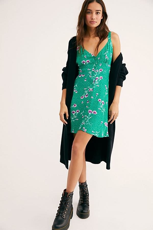 Promising review: "I ordered a small originally and it was much too large in the chest. I definitely recommend ordering a size down. This dress is adorable so get it, but just get it smaller!" —maddiierothPrice: .95 (originally , available in sizes XS-L and in green and black)