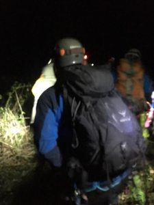 Image may contain: one or more people, people standing and outdoor