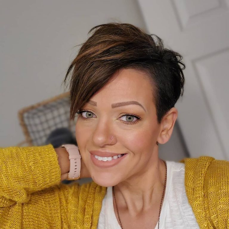 Image may contain: 1 person, smiling, close-up