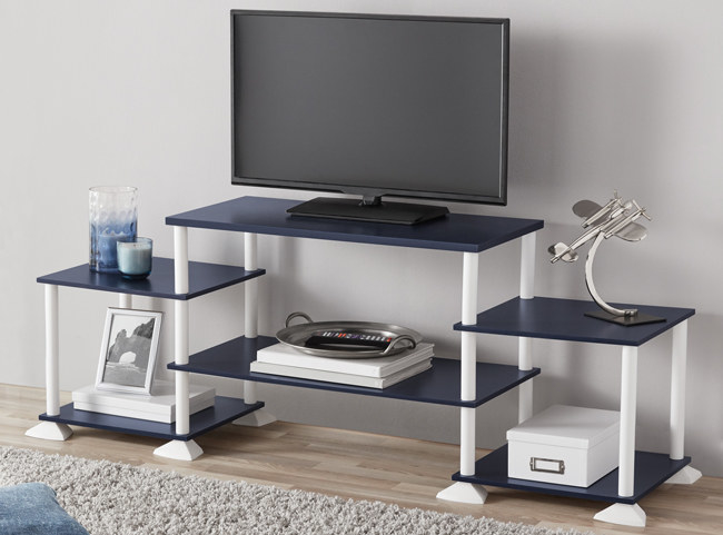 Promising review: “This by far is the best entertainment stand I could have purchased from Walmart. It honestly took me seven minutes to put together. All it is is a bunch of twisting on and it&#x27;s together. I would recommend getting this product.” —Amina Price: .99 (available in seven colors)
