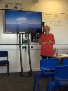 Image may contain: 1 person, standing, screen and indoor