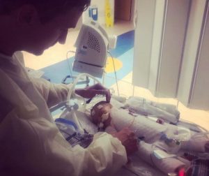 Image may contain: one or more people, table and indoor