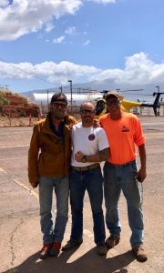 Image may contain: 1 person, smiling, standing, cloud, sky, shoes and outdoor