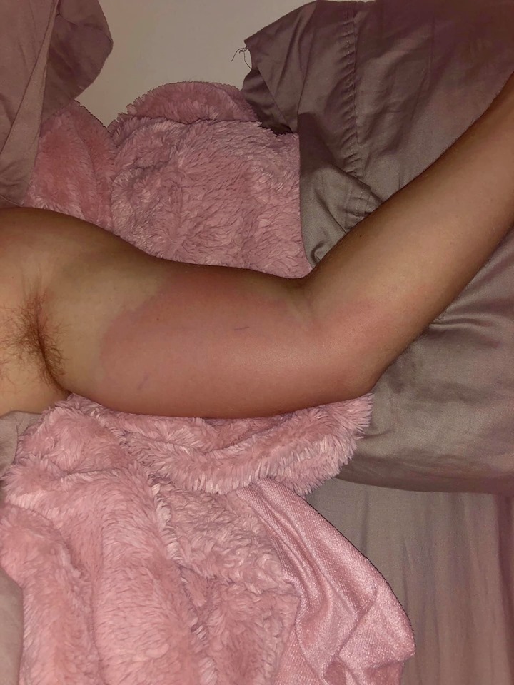 Image may contain: one or more people, people sleeping and indoor