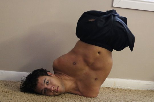 *** EXCLUSIVE - VIDEO AVAILABLE *** ROY, UTAH - JANUARY 19: Gabe Adams in a breakdance pose on 19 January 2019 in Roy, Utah. A MAN born with no limbs, who took up break dancing as a way of making friends, discovered he not only had a gift for it but that it could inspire others. Gabe Adams, 19, was born in Sao Paulo, Brazil with Hanhart syndrome, a rare medical condition characterised by underdeveloped limbs, mouth and jaw. In Gabe?s case none of his limbs grew at all. Adopted by American parents Janelle and Ron Adams, Gabe was brought to the US as a baby and grew up with his 13 siblings in Kaysville, Utah. From a young age Gabe started using a wheelchair but parents Ron and Janelle were determined that their son would be as independent as possible, pushing Gabe to learn to move independently of his wheelchair. At school he tried out for the dance team as a way of making friends ? discovering he could use his limbless body to his advantage in the art of break dancing. After graduating from high school Gabe has continued to prove his independence, moving out of the family home and embarking on a career as a motivational speaker. PHOTOGRAPH BY Sohrab Mirmont / Barcroft Images