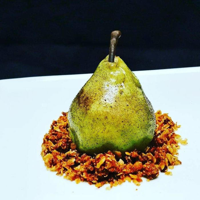 Pear Crumble. Pear Mousse, Filled With A Custard, Mirror Glazed And Flecked, Brown Butter Granola Pear Crumble. Pear Mousse, Filled With A Custard, Mirror Glazed And Flecked, Brown Butter Granola